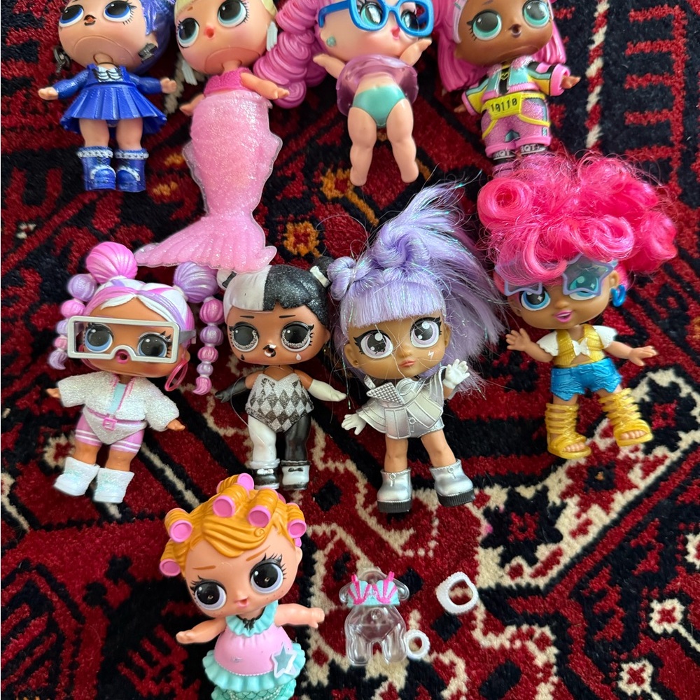 Lot of 9 L.O.L  Dolls